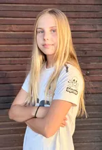 Greta E.